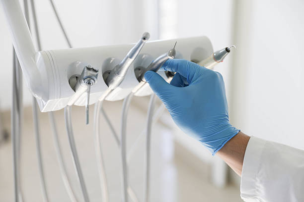 Professional Tooth Extraction technician working in Pasadena Hills, FL